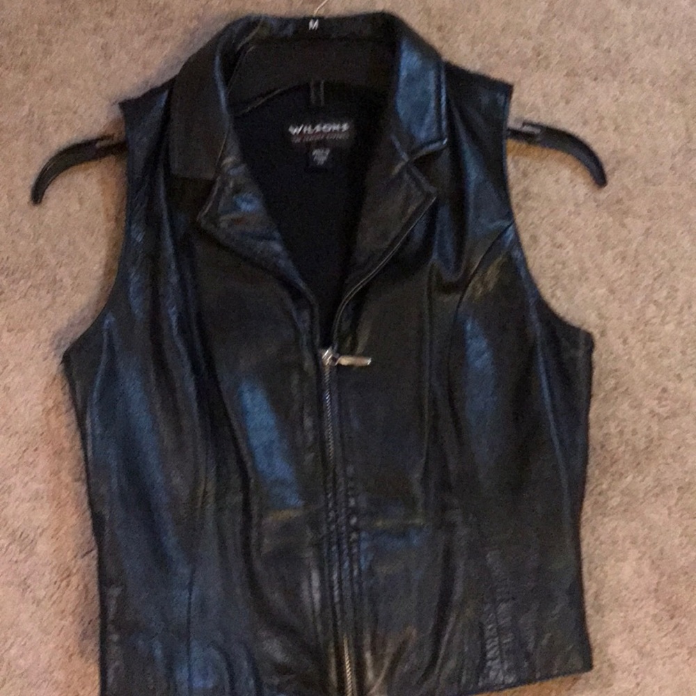 Real leather vest zips up front